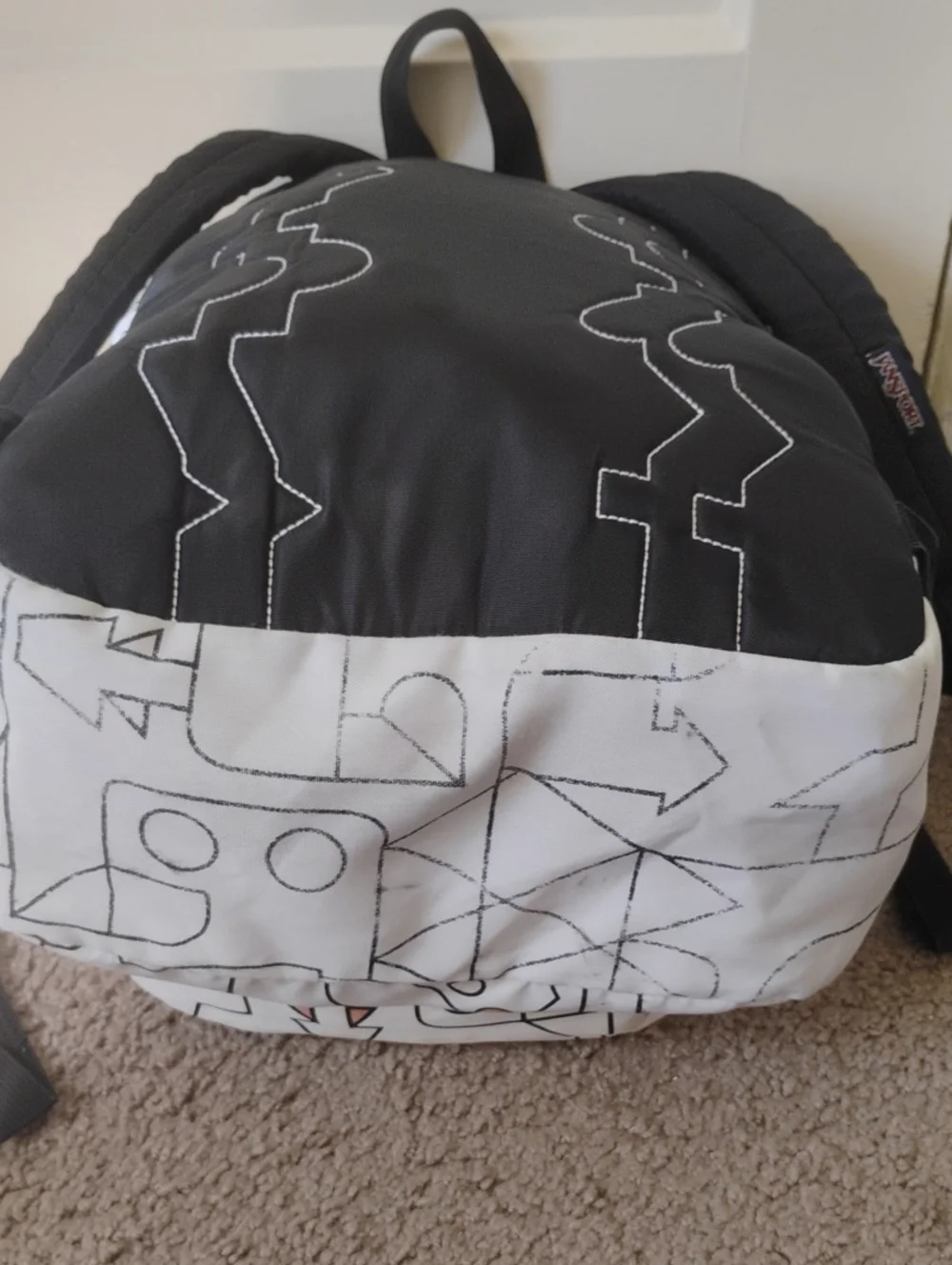 JanSport White Graphic Classic Backpack Puzzle Piece Pattern